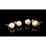 Two pairs of pearl and 14ct yellow gold stud