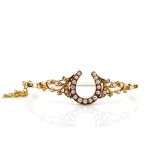 Antique gold and pearl horseshoe bangle