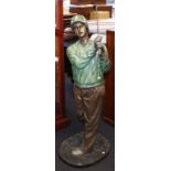 Large cast metal swinging golf statue
