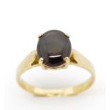 Cats eye quartz set yellow gold ring