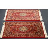 Two small Middle Eastern style rugs