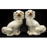 Pair of Staffordshire ceramic mantle dogs