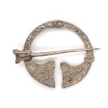 A sterling silver "Celtic" annular brooch