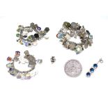 Three silver charm bracelets and jewellery group