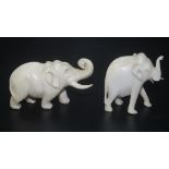 Two vintage Oriental carved ivory elephant figures