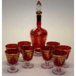 Nine piece red glass liqueur set