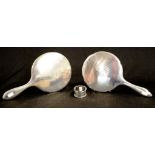 Two various sterling silver backed hand mirrors