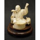 Antique Japanese carved ivory seated gentleman