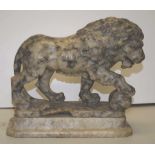 Carved marble lion sculpture