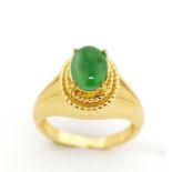 Jade set yellow metal ring