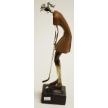 Composite lady golfing figure