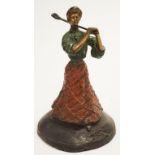Cast metal figure of an early lady golfer