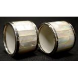 Two sterling silver & mother of pearl napkin rings