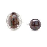 Two boulder opal set silver rings