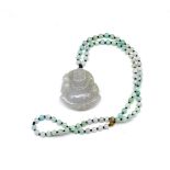 Carved jade Buddha pendant and beaded necklace