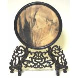 Chinese marble disc on carved wood stand