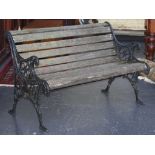 Cast iron and wood slat garden seat