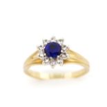 Created sapphire and 9ct yellow gold ring