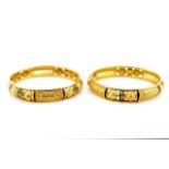 Two 21ct yellow gold and enamel bangles