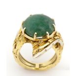 Green gemstone and yellow gold Modernist ring