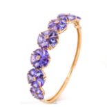 Tanzanite set 18ct rose gold flower bangle