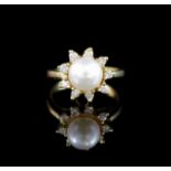 Pearl and diamond yellow gold ring