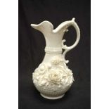 Good antique Belleek floral encrusted jug