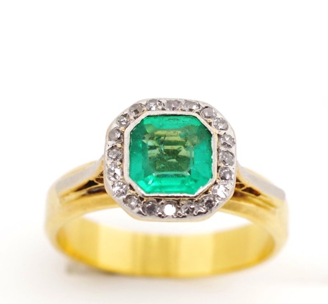 Emerald and diamond set yellow gold ring