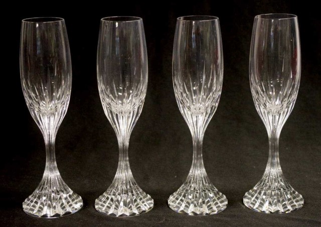 Set four Baccarat crystal champagne flutes