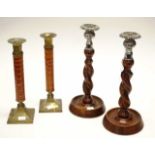 Two pairs of decorative candlesticks
