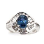 Sapphire and diamond halo set platinum ring