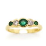 Emerald and diamond set 18ct yellow gold ring