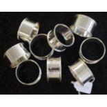 Set of nine silver napkin rings