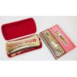 Two vintage harmonica's in original boxes
