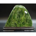 Polished green jade specimen