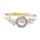 Ladies vintage 18ct and diamond bangle watch