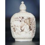 Antique carved ivory snuff bottle