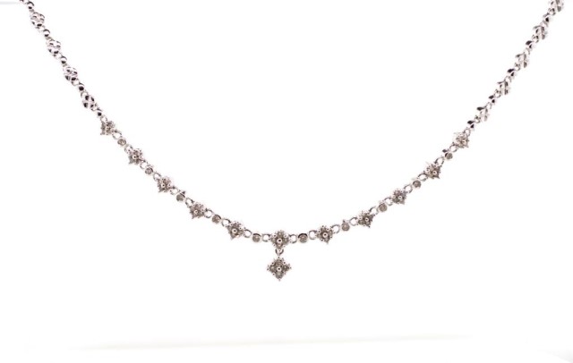 A good 18ct white gold and diamond flower necklace