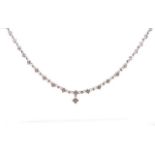 A good 18ct white gold and diamond flower necklace