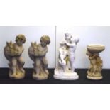 Four concrete garden figurines / ornaments