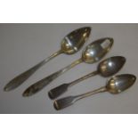 Four sterling silver dessert/serving spoons