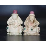 Two antique carved ivory snuff bottles