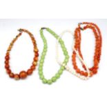 Five coral beaded necklaces