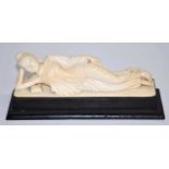 Antique carved ivory figure of reclining Buddha