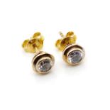 Cubic zirconia and 9ct yellow gold stud earrings