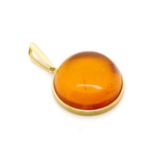 Amber and 18ct yellow gold pendant