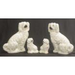 Four Antique Staffordshire mantle dogs