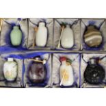 Eight various boxed Chinese snuff bottles