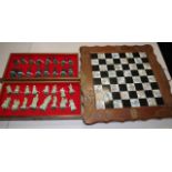 Chinese carved wood chess board & pieces