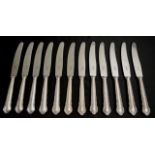 Twelve Scandinavian silver handled entree knives